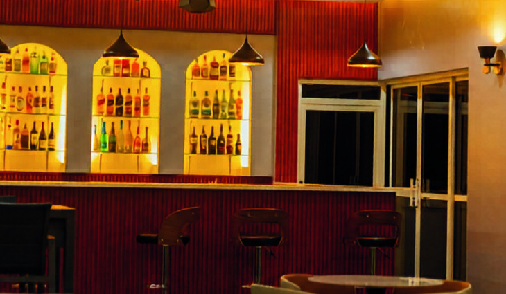The bar counter and seating at Fort-Arch Eco Lodges