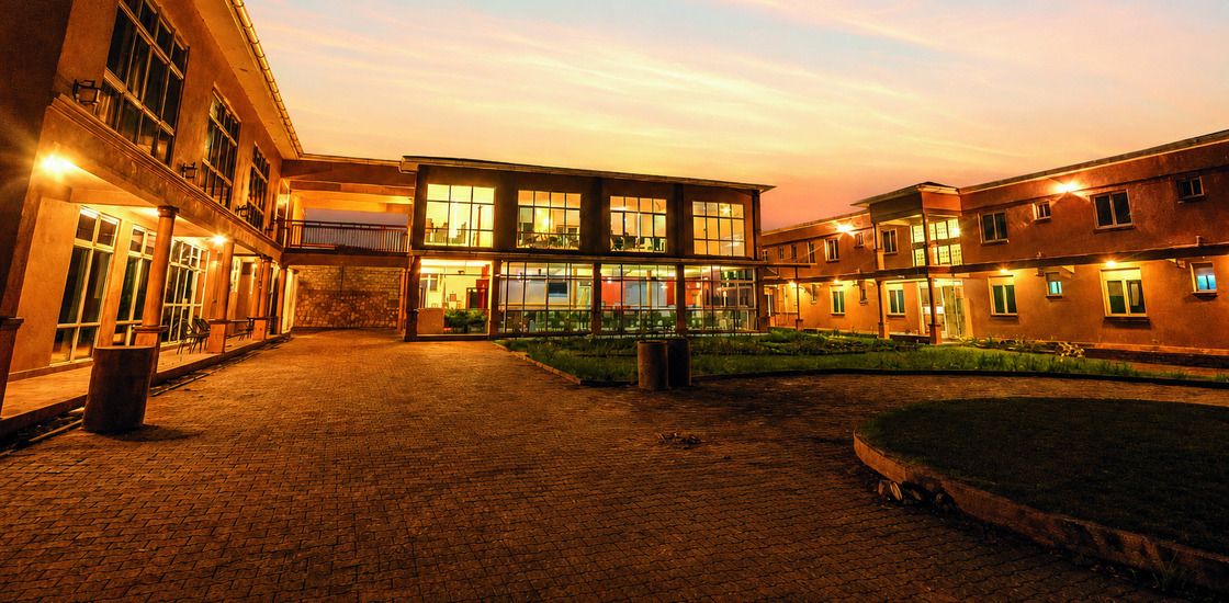 Fort-Arch Eco Lodges courtyard and buildings at sunset