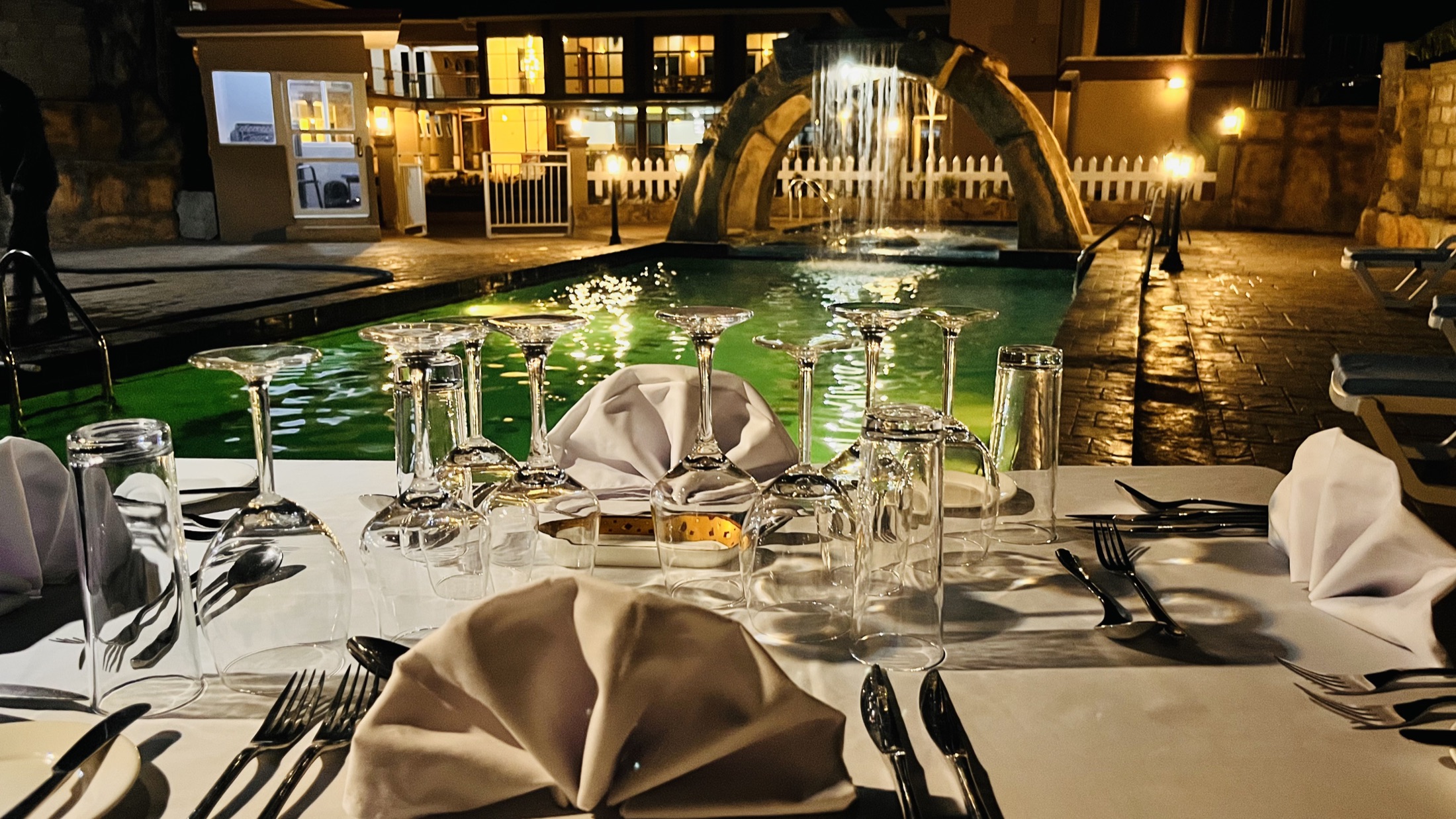 Poolside dining at Fort Arch Eco Lodges